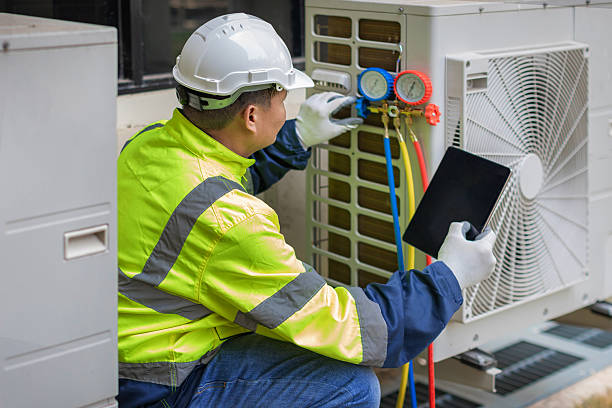 Professional Emergency Ac Repair technician working in Fowler, MI